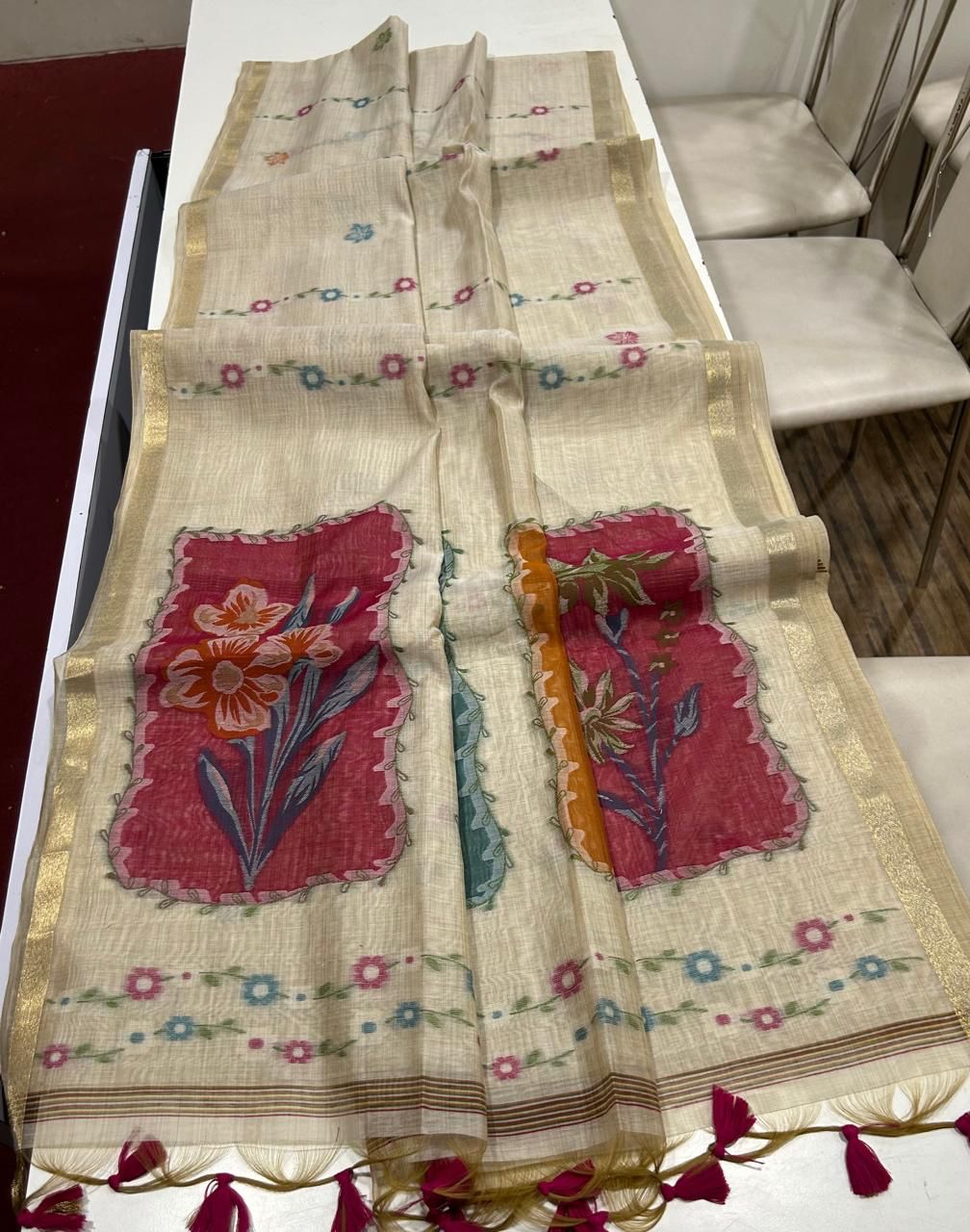 Premium muga cotton saree with multi colour flower weaving pallu
