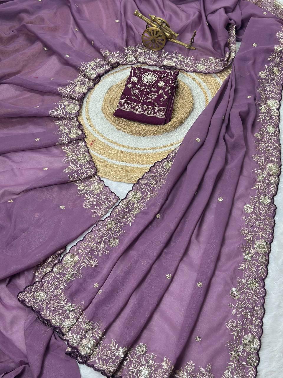 Heavy star georgette silk saree with zari weaving and thread embroidered work